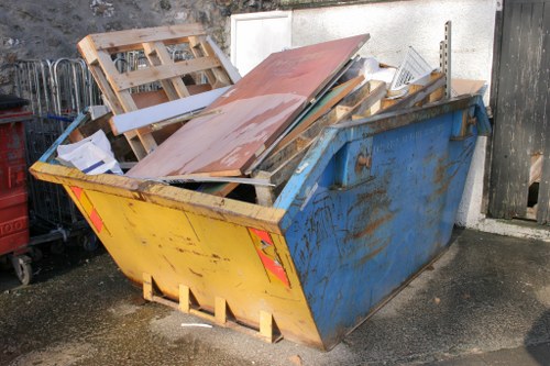 Team clearing furniture from a Woodgreen home